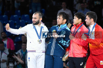 2024-07-27 - Luka Mkheidze ( FRA ) Silver, Yeldos Smetov ( KAZ ) Gold, Ryuju Nagamaya ( JPN ) and Francisco Garrigos ( ESP ) Bronze, Judo, Men -60 kg Final during the Olympic Games Paris 2024 on 27 July 2024 at Arena Champ de Mars in Paris, France - OLYMPIC GAMES PARIS 2024 - 27/07 - OLYMPIC GAMES PARIS 2024 - OLYMPIC GAMES