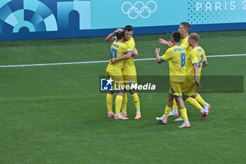 2024-07-27 - Maksym Braharu (Ukraine) celebrates his goal, Football, Men's Group B between Ukraine and Morocco during the Olympic Games Paris 2024 on 27 July 2024 at Geoffroy-Guichard Stadium in Saint-Etienne, France - OLYMPIC GAMES PARIS 2024 - 27/07 - OLYMPIC GAMES PARIS 2024 - OLYMPIC GAMES