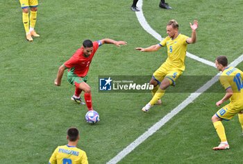 2024-07-27 - Achraf Hakimi (Morocco) and Valentyn Rubchynskyi (Ukraine), Football, Men's Group B between Ukraine and Morocco during the Olympic Games Paris 2024 on 27 July 2024 at Geoffroy-Guichard Stadium in Saint-Etienne, France - OLYMPIC GAMES PARIS 2024 - 27/07 - OLYMPIC GAMES PARIS 2024 - OLYMPIC GAMES