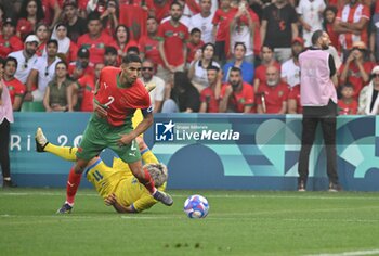 2024-07-27 - Achraf Hakimi (Morocco), Football, Men's Group B between Ukraine and Morocco during the Olympic Games Paris 2024 on 27 July 2024 at Geoffroy-Guichard Stadium in Saint-Etienne, France - OLYMPIC GAMES PARIS 2024 - 27/07 - OLYMPIC GAMES PARIS 2024 - OLYMPIC GAMES