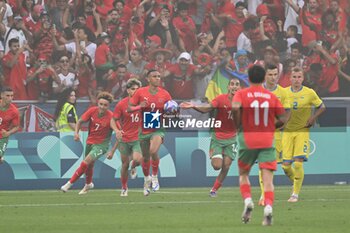 2024-07-27 - Soufiane Rahimi of Morocco celebrates his goal, Football, Men's Group B between Ukraine and Morocco during the Olympic Games Paris 2024 on 27 July 2024 at Geoffroy-Guichard Stadium in Saint-Etienne, France - OLYMPIC GAMES PARIS 2024 - 27/07 - OLYMPIC GAMES PARIS 2024 - OLYMPIC GAMES