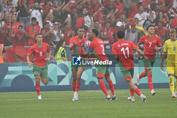 2024-07-27 - Soufiane Rahimi of Morocco celebrates his goal, Football, Men's Group B between Ukraine and Morocco during the Olympic Games Paris 2024 on 27 July 2024 at Geoffroy-Guichard Stadium in Saint-Etienne, France - OLYMPIC GAMES PARIS 2024 - 27/07 - OLYMPIC GAMES PARIS 2024 - OLYMPIC GAMES