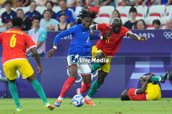 2024-07-27 - Manu Koné (France) and Ousmane Camara (Guinea), Football, Men's Group A between France and Guinea during the Olympic Games Paris 2024 on 27 July 2024 at Allianz Riviera in Nice, France - OLYMPIC GAMES PARIS 2024 - 27/07 - OLYMPIC GAMES PARIS 2024 - OLYMPIC GAMES