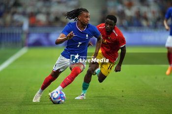 2024-07-27 - Michael Olise (France) and Amadou Diallo (Guinea), Football, Men's Group A between France and Guinea during the Olympic Games Paris 2024 on 27 July 2024 at Allianz Riviera in Nice, France - OLYMPIC GAMES PARIS 2024 - 27/07 - OLYMPIC GAMES PARIS 2024 - OLYMPIC GAMES