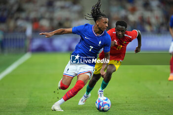 2024-07-27 - Michael Olise (France) and Amadou Diallo (Guinea), Football, Men's Group A between France and Guinea during the Olympic Games Paris 2024 on 27 July 2024 at Allianz Riviera in Nice, France - OLYMPIC GAMES PARIS 2024 - 27/07 - OLYMPIC GAMES PARIS 2024 - OLYMPIC GAMES