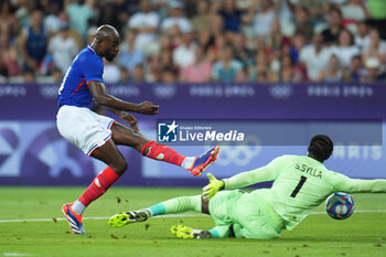 2024-07-27 - Jean-Philippe Mateta (France) and Soumaila Sylla (Guinea), Football, Men's Group A between France and Guinea during the Olympic Games Paris 2024 on 27 July 2024 at Allianz Riviera in Nice, France - OLYMPIC GAMES PARIS 2024 - 27/07 - OLYMPIC GAMES PARIS 2024 - OLYMPIC GAMES