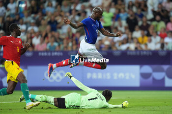 2024-07-27 - Jean-Philippe Mateta (France) and Soumaila Sylla (Guinea), Football, Men's Group A between France and Guinea during the Olympic Games Paris 2024 on 27 July 2024 at Allianz Riviera in Nice, France - OLYMPIC GAMES PARIS 2024 - 27/07 - OLYMPIC GAMES PARIS 2024 - OLYMPIC GAMES