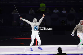 2024-07-27 - OH Sanguk of Republic of Korea, FERJANI Fares of Tunisia, Men's Sabre Individual Fencing during the Olympic Games Paris 2024 on 27 July 2024 at Le Grand Palais in Paris, France - OLYMPIC GAMES PARIS 2024 - 27/07 - OLYMPIC GAMES PARIS 2024 - OLYMPIC GAMES