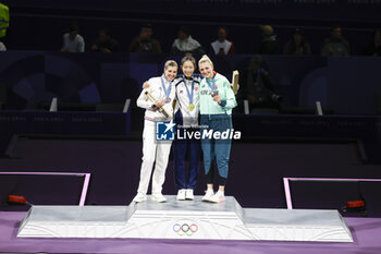 2024-07-27 - MALLO-BRETON Auriane of France, KONG Man Wai Vivian of Hong Kong, China, MUHARI Eszter of Hungary, Women's Épée Individual Fencing, podium, during the Olympic Games Paris 2024 on 27 July 2024 at Le Grand Palais in Paris, France - OLYMPIC GAMES PARIS 2024 - 27/07 - OLYMPIC GAMES PARIS 2024 - OLYMPIC GAMES