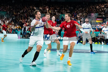 2024-07-27 - Valentin Porte (France) and Simon Pytlick (Denmark), Handball, Men's Preliminary Round Group B between Denmark and France during the Olympic Games Paris 2024 on 27 July 2024 at South Paris Arena 6 in Paris, France - OLYMPIC GAMES PARIS 2024 - 27/07 - OLYMPIC GAMES PARIS 2024 - OLYMPIC GAMES