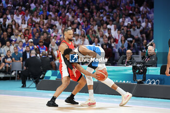 2024-07-27 - Giannis Antetokounmpo of Greece and Dillon Brooks of Canada, Basketball, Men's Group Phase - Group A between Greece and Canada during the Olympic Games Paris 2024 on 27 July 2024 in Villeneuve-d'Ascq near Lille, France - OLYMPIC GAMES PARIS 2024 - 27/07 - OLYMPIC GAMES PARIS 2024 - OLYMPIC GAMES