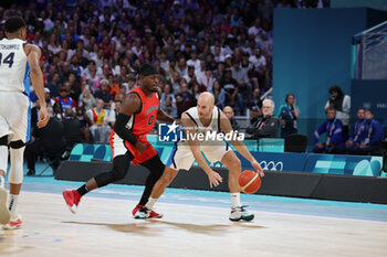 2024-07-27 - Nick Calathes of Greece and Luguentz Dort of Canada, Basketball, Men's Group Phase - Group A between Greece and Canada during the Olympic Games Paris 2024 on 27 July 2024 in Villeneuve-d'Ascq near Lille, France - OLYMPIC GAMES PARIS 2024 - 27/07 - OLYMPIC GAMES PARIS 2024 - OLYMPIC GAMES