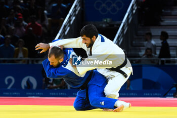 2024-07-27 - Salih Yildiz ( TUR ) against Luka Mkheidze ( FRA ), Judo, Men -60 kg during the Olympic Games Paris 2024 on 27 July 2024 at Arena Champ de Mars in Paris, France - OLYMPIC GAMES PARIS 2024 - 27/07 - OLYMPIC GAMES PARIS 2024 - OLYMPIC GAMES