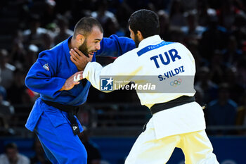 2024-07-27 - Salih Yildiz ( TUR ) against Luka Mkheidze ( FRA ), Judo, Men -60 kg during the Olympic Games Paris 2024 on 27 July 2024 at Arena Champ de Mars in Paris, France - OLYMPIC GAMES PARIS 2024 - 27/07 - OLYMPIC GAMES PARIS 2024 - OLYMPIC GAMES