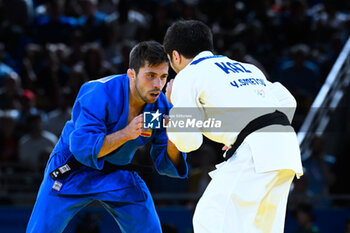 2024-07-27 - Yeldos Smetov ( KAZ ) against Francisco Garrigos ( ESP ), Judo, Men -60 kg during the Olympic Games Paris 2024 on 27 July 2024 at Arena Champ de Mars in Paris, France - OLYMPIC GAMES PARIS 2024 - 27/07 - OLYMPIC GAMES PARIS 2024 - OLYMPIC GAMES