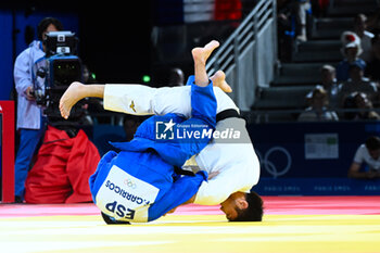 2024-07-27 - Yeldos Smetov ( KAZ ) against Francisco Garrigos ( ESP ), Judo, Men -60 kg during the Olympic Games Paris 2024 on 27 July 2024 at Arena Champ de Mars in Paris, France - OLYMPIC GAMES PARIS 2024 - 27/07 - OLYMPIC GAMES PARIS 2024 - OLYMPIC GAMES