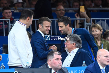 2024-07-27 - Emmanuel Macron ( French president ), Tony Estanguet ( president JO 2024 ), David Douillet and Stephane Nomis ( president FFJudo ), Judo, during the Olympic Games Paris 2024 on 27 July 2024 at Arena Champ de Mars in Paris, France - OLYMPIC GAMES PARIS 2024 - 27/07 - OLYMPIC GAMES PARIS 2024 - OLYMPIC GAMES