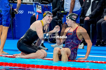 2024-07-27 - Angelina Koehler of Germany and Gretchen Walsh of United States of America competing in the Women's 100m Butterfly Semifinals during Day 1 of Swimming during the Olympic Games Paris 2024 on 27 July 2024 at Paris La Defense Arena in Paris, France - OLYMPIC GAMES PARIS 2024 - 27/07 - OLYMPIC GAMES PARIS 2024 - OLYMPIC GAMES