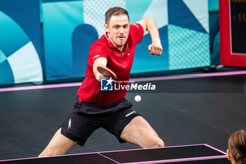 2024-07-27 - Ovidiu Ionescu (ROU), Mixed doubles round of 16, Table Tennis, during the Olympic Games Paris 2024 on 27 July 2024 at South Paris Arena 4 in Paris, France - OLYMPIC GAMES PARIS 2024 - 27/07 - OLYMPIC GAMES PARIS 2024 - OLYMPIC GAMES