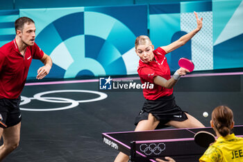 2024-07-27 - Ovidiu Ionescu and Bernadette Szocs (ROU), Mixed doubles round of 16, Table Tennis, during the Olympic Games Paris 2024 on 27 July 2024 at South Paris Arena 4 in Paris, France - OLYMPIC GAMES PARIS 2024 - 27/07 - OLYMPIC GAMES PARIS 2024 - OLYMPIC GAMES