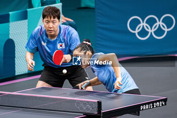 2024-07-27 - Jonghoon Lim and Yubin Shin (KOR), Mixed doubles round of 16, Table Tennis, during the Olympic Games Paris 2024 on 27 July 2024 at South Paris Arena 4 in Paris, France - OLYMPIC GAMES PARIS 2024 - 27/07 - OLYMPIC GAMES PARIS 2024 - OLYMPIC GAMES