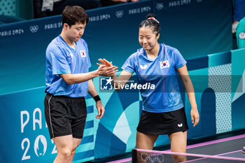 2024-07-27 - Jonghoon Lim and Yubin Shin (KOR), Mixed doubles round of 16, Table Tennis, during the Olympic Games Paris 2024 on 27 July 2024 at South Paris Arena 4 in Paris, France - OLYMPIC GAMES PARIS 2024 - 27/07 - OLYMPIC GAMES PARIS 2024 - OLYMPIC GAMES