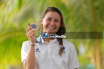 2024-08-05 - Johanne Defay of France Bronze medal, Surfing, Women's during the Olympic Games Paris 2024 on 6 August 2024 at Teahupo'o in Tahiti, French Polynesia - OLYMPIC GAMES PARIS 2024 - 06/08 - OLYMPIC GAMES PARIS 2024 - OLYMPIC GAMES