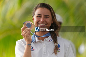 2024-08-05 - Johanne Defay of France Bronze medal, Surfing, Women's during the Olympic Games Paris 2024 on 6 August 2024 at Teahupo'o in Tahiti, French Polynesia - OLYMPIC GAMES PARIS 2024 - 06/08 - OLYMPIC GAMES PARIS 2024 - OLYMPIC GAMES