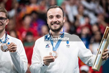 2024-08-09 - Simon Cauzy (FRA) Bronze medal, Table Tennis, Men's Team during the Olympic Games Paris 2024 on 9 August 2024 at South Paris Arena in Paris, France - OLYMPIC GAMES PARIS 2024 - 09/08 - OLYMPIC GAMES PARIS 2024 - OLYMPIC GAMES