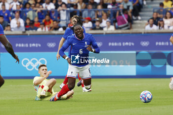 2024-08-09 - Manu Koné of France is fouled by Fermín López of Spain, Football, Men's Gold Medal Match between France and Spain during the Olympic Games Paris 2024 on 9 August 2024 at Parc des Princes in Paris, France - OLYMPIC GAMES PARIS 2024 - 09/08 - OLYMPIC GAMES PARIS 2024 - OLYMPIC GAMES