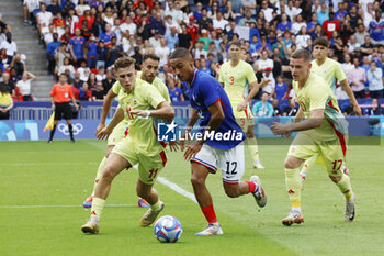 2024-08-09 - Enzo Millot of France and Fermín López, Sergio Gómez of Spain, Football, Men's Gold Medal Match between France and Spain during the Olympic Games Paris 2024 on 9 August 2024 at Parc des Princes in Paris, France - OLYMPIC GAMES PARIS 2024 - 09/08 - OLYMPIC GAMES PARIS 2024 - OLYMPIC GAMES