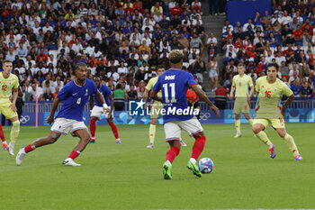 2024-08-09 - Désiré Doué, Loïc Badé of France and Adrián Bernabé of Spain, Football, Men's Gold Medal Match between France and Spain during the Olympic Games Paris 2024 on 9 August 2024 at Parc des Princes in Paris, France - OLYMPIC GAMES PARIS 2024 - 09/08 - OLYMPIC GAMES PARIS 2024 - OLYMPIC GAMES