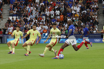 2024-08-09 - Jean-Philippe Mateta of France and Juanlu Sánchez, Eric García of Spain, Football, Men's Gold Medal Match between France and Spain during the Olympic Games Paris 2024 on 9 August 2024 at Parc des Princes in Paris, France - OLYMPIC GAMES PARIS 2024 - 09/08 - OLYMPIC GAMES PARIS 2024 - OLYMPIC GAMES