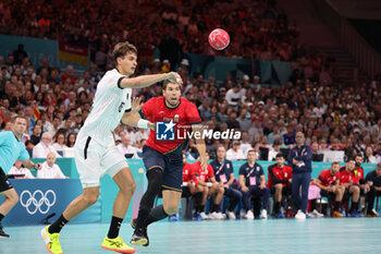 2024-08-09 - Julian KOESTER (Germany) and Daniel DUJSHEBAEV (Spain), Handball, Men's Semifinal between Germany and Spain during the Olympic Games Paris 2024 on 9 August 2024 at Pierre Mauroy stadium in Villeneuve-d'Ascq near Lille, France - OLYMPIC GAMES PARIS 2024 - 09/08 - OLYMPIC GAMES PARIS 2024 - OLYMPIC GAMES