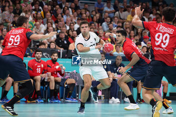 2024-08-09 - Renars USCINS (Germany), Handball, Men's Semifinal between Germany and Spain during the Olympic Games Paris 2024 on 9 August 2024 at Pierre Mauroy stadium in Villeneuve-d'Ascq near Lille, France - OLYMPIC GAMES PARIS 2024 - 09/08 - OLYMPIC GAMES PARIS 2024 - OLYMPIC GAMES