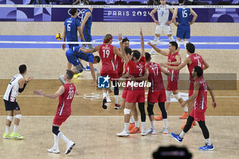 2024-08-09 - Celebration of USA, Volleyball, Men's Bronze Medal Match between Italy and United States during the Olympic Games Paris 2024 on 9 August 2024 at South Paris Arena in Paris, France - OLYMPIC GAMES PARIS 2024 - 09/08 - OLYMPIC GAMES PARIS 2024 - OLYMPIC GAMES