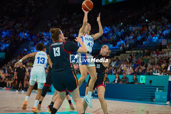 2024-08-09 - Romane Bernies of France and Kyara Linskens, Julie Vanloo of Belgium, Basketball, Women's Semifinal between France and Belgium during the Olympic Games Paris 2024 on 9 August 2024 at Bercy Arena in Paris, France - OLYMPIC GAMES PARIS 2024 - 09/08 - OLYMPIC GAMES PARIS 2024 - OLYMPIC GAMES