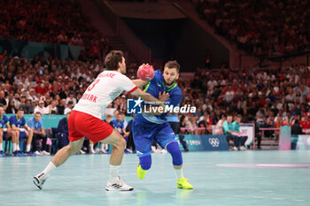 2024-08-09 - Aleks Vlah (Slovenia) and Niclas Kirkelokke (Denmark), Handball, Men's Semifinal between Slovenia and Denmark during the Olympic Games Paris 2024 on 9 August 2024 at Pierre Mauroy stadium in Villeneuve-d'Ascq near Lille, France - OLYMPIC GAMES PARIS 2024 - 09/08 - OLYMPIC GAMES PARIS 2024 - OLYMPIC GAMES