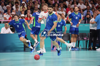 2024-08-09 - Blaz Janc (Slovenia), Handball, Men's Semifinal between Slovenia and Denmark during the Olympic Games Paris 2024 on 9 August 2024 at Pierre Mauroy stadium in Villeneuve-d'Ascq near Lille, France - OLYMPIC GAMES PARIS 2024 - 09/08 - OLYMPIC GAMES PARIS 2024 - OLYMPIC GAMES