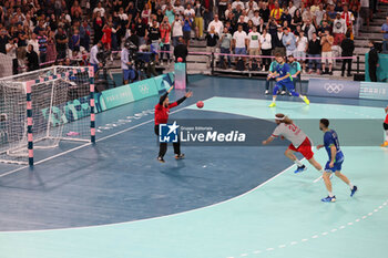 2024-08-09 - Mikkel Hansen (Denmark) and Klemen Ferlin (Slovenia), Handball, Men's Semifinal between Slovenia and Denmark during the Olympic Games Paris 2024 on 9 August 2024 at Pierre Mauroy stadium in Villeneuve-d'Ascq near Lille, France - OLYMPIC GAMES PARIS 2024 - 09/08 - OLYMPIC GAMES PARIS 2024 - OLYMPIC GAMES