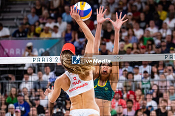 2024-08-09 - Nina Brunner (SUI) and Taliqua Clancy (AUS), Beach Volleyball, Women's Bronze Medal Match between Australia and Switzerland during the Olympic Games Paris 2024 on 9 August 2024 at Eiffel Tower Stadium in Paris, France - OLYMPIC GAMES PARIS 2024 - 09/08 - OLYMPIC GAMES PARIS 2024 - OLYMPIC GAMES