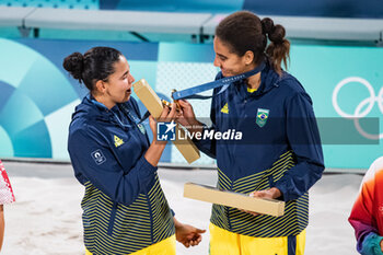 2024-08-10 - Ana Patricia Silva Ramos and Eduarda Santos Lisboa (BRA) Gold medal, Beach Volleyball, Women's during the Olympic Games Paris 2024 on 9 August 2024 at Eiffel Tower Stadium in Paris, France - OLYMPIC GAMES PARIS 2024 - 09/08 - OLYMPIC GAMES PARIS 2024 - OLYMPIC GAMES