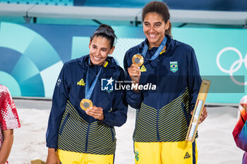 2024-08-10 - Ana Patricia Silva Ramos and Eduarda Santos Lisboa (BRA) Gold medal, Beach Volleyball, Women's during the Olympic Games Paris 2024 on 9 August 2024 at Eiffel Tower Stadium in Paris, France - OLYMPIC GAMES PARIS 2024 - 09/08 - OLYMPIC GAMES PARIS 2024 - OLYMPIC GAMES