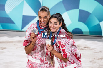 2024-08-10 - Melissa Humana Paredes and Brandie Wilkerson (CAN) Silver medal, Beach Volleyball, Women's during the Olympic Games Paris 2024 on 9 August 2024 at Eiffel Tower Stadium in Paris, France - OLYMPIC GAMES PARIS 2024 - 09/08 - OLYMPIC GAMES PARIS 2024 - OLYMPIC GAMES