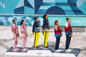 2024-08-10 - Melissa Humana Paredes and Brandie Wilkerson (CAN) Silver medal, Ana Patricia Silva Ramos and Eduarda Santos Lisboa (BRA) Gold medal, Tanja Hueberli and Nina Brunner (SUI) Bronze medal, Beach Volleyball, Women's during the Olympic Games Paris 2024 on 9 August 2024 at Eiffel Tower Stadium in Paris, France - OLYMPIC GAMES PARIS 2024 - 09/08 - OLYMPIC GAMES PARIS 2024 - OLYMPIC GAMES