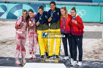 2024-08-10 - Melissa Humana Paredes and Brandie Wilkerson (CAN) Silver medal, Ana Patricia Silva Ramos and Eduarda Santos Lisboa (BRA) Gold medal, Tanja Hueberli and Nina Brunner (SUI) Bronze medal, Beach Volleyball, Women's during the Olympic Games Paris 2024 on 9 August 2024 at Eiffel Tower Stadium in Paris, France - OLYMPIC GAMES PARIS 2024 - 09/08 - OLYMPIC GAMES PARIS 2024 - OLYMPIC GAMES