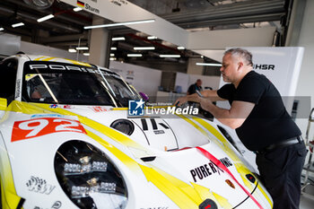 2024-02-25 - 92 MALYKHIN Aliaksandr (kna), STURM Joel (ger), BACHLER Klaus (aut), Manthey Purerxcing, Porsche 911 GT3 R #91, garage, box, set up during the Prologue of the 2024 FIA World Endurance Championship, from February 24 to 26, 2024 on the Losail International Circuit in Lusail, Qatar - FIA WEC - PROLOGUE 2024 - QATAR - ENDURANCE - MOTORS