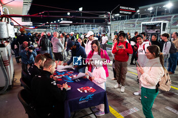 2024-03-01 - Porsche Penske Motorsport, autograph session during the Qatar Airways Qatar 1812 KM, 1st round of the 2024 FIA World Endurance Championship, from February 29 to March 02, 2024 on the Losail International Circuit in Lusail, Qatar - FIA WEC - QATAR AIRWAYS QATAR 1812 KM - ENDURANCE - MOTORS