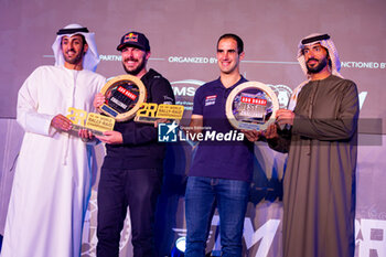 2024-03-02 - JONES Austin (USA), MENA Oriol (ESP), Can-Am Factory Team, Can-Am Maverick, FIA W2RC, portrait during the Prize Giving Ceremony of the 2024 Abu Dhabi Desert Challenge, on March 2, 2024 in Abu Dhabi, United Arab Emirates - W2RC - ABU DHABI DESERT CHALLENGE 2024 - ENDURANCE - MOTORS