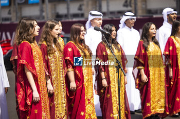 2024-03-02 - National Anthem during the Qatar Airways Qatar 1812 KM, 1st round of the 2024 FIA World Endurance Championship, from February 29 to March 02, 2024 on the Losail International Circuit in Lusail, Qatar - FIA WEC - QATAR AIRWAYS QATAR 1812 KM - ENDURANCE - MOTORS